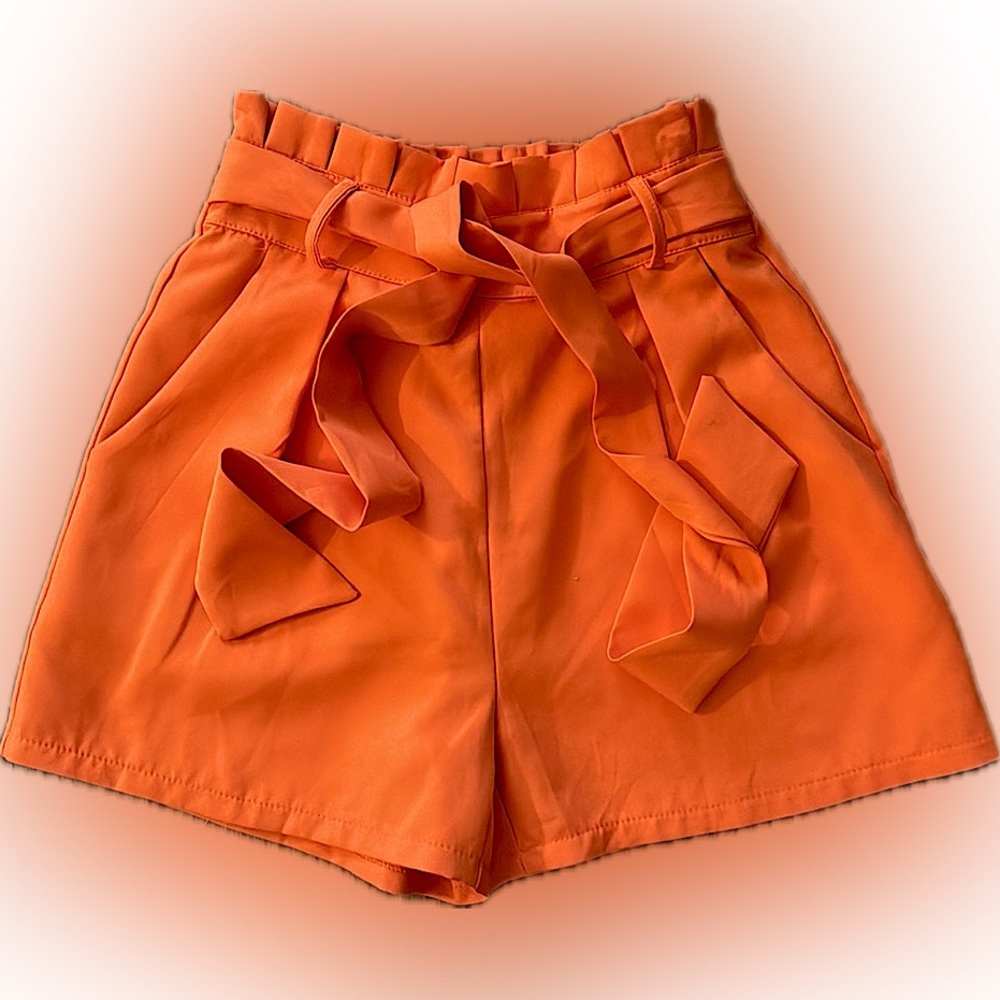 Stylish bright orange high rise shorts